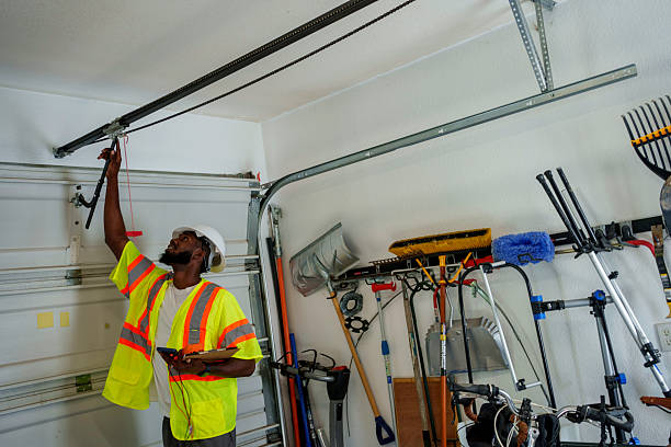Professional Garage Door Panel Replacement technician working in Byesville, OH